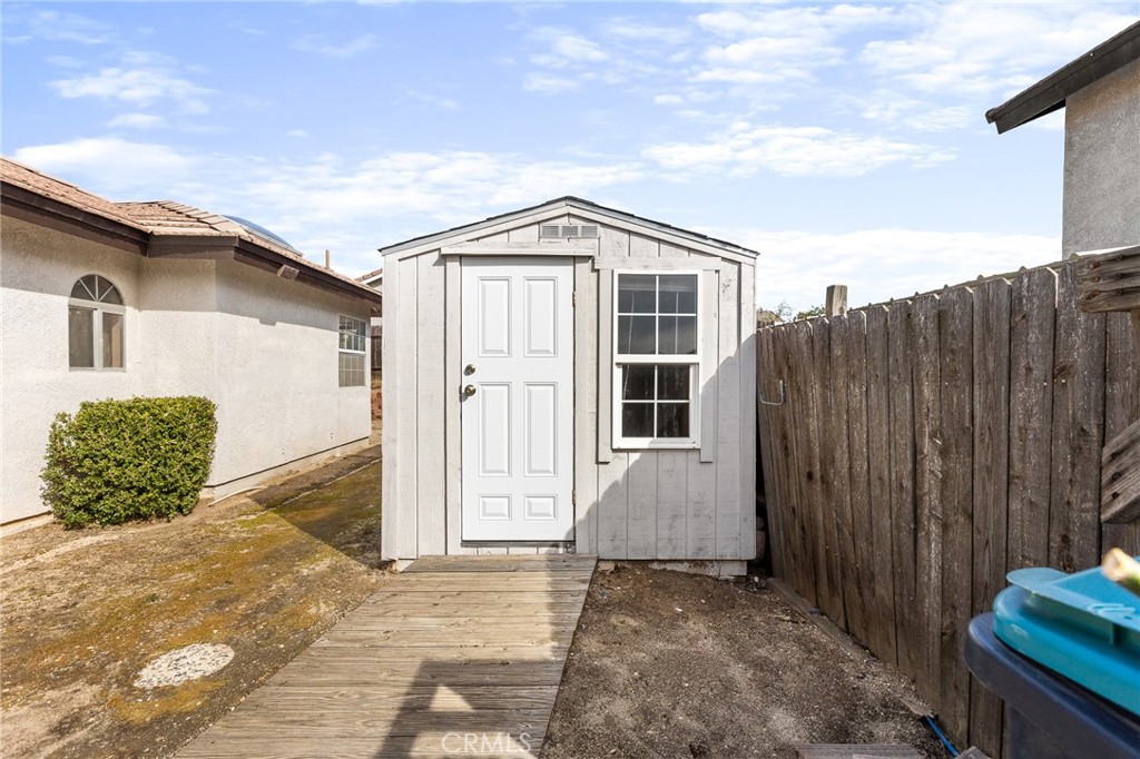 1002 Oregon Trail Banning, CA 92220 - Photo 11 of 35 South backyard shed