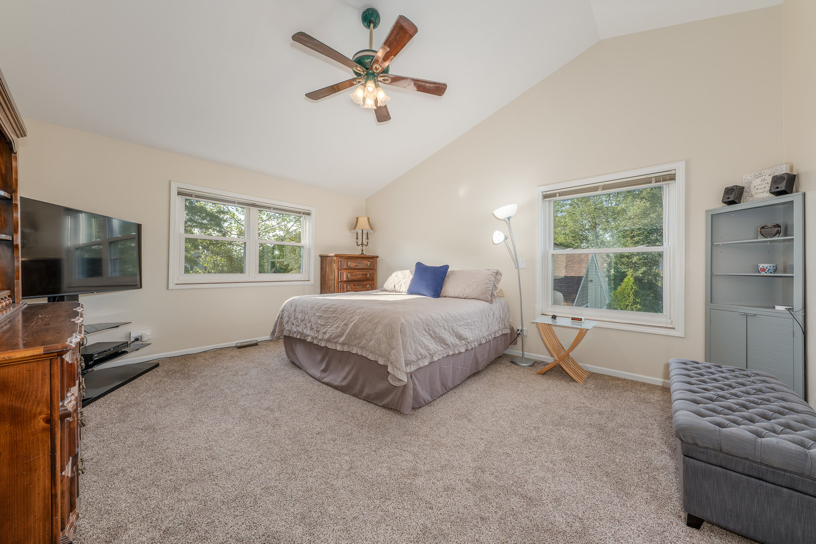 113 Bittersweet Lane Streamwood, IL 60107 - Photo 12 of 24 a spacious bedroom with a bed and a flat screen tv