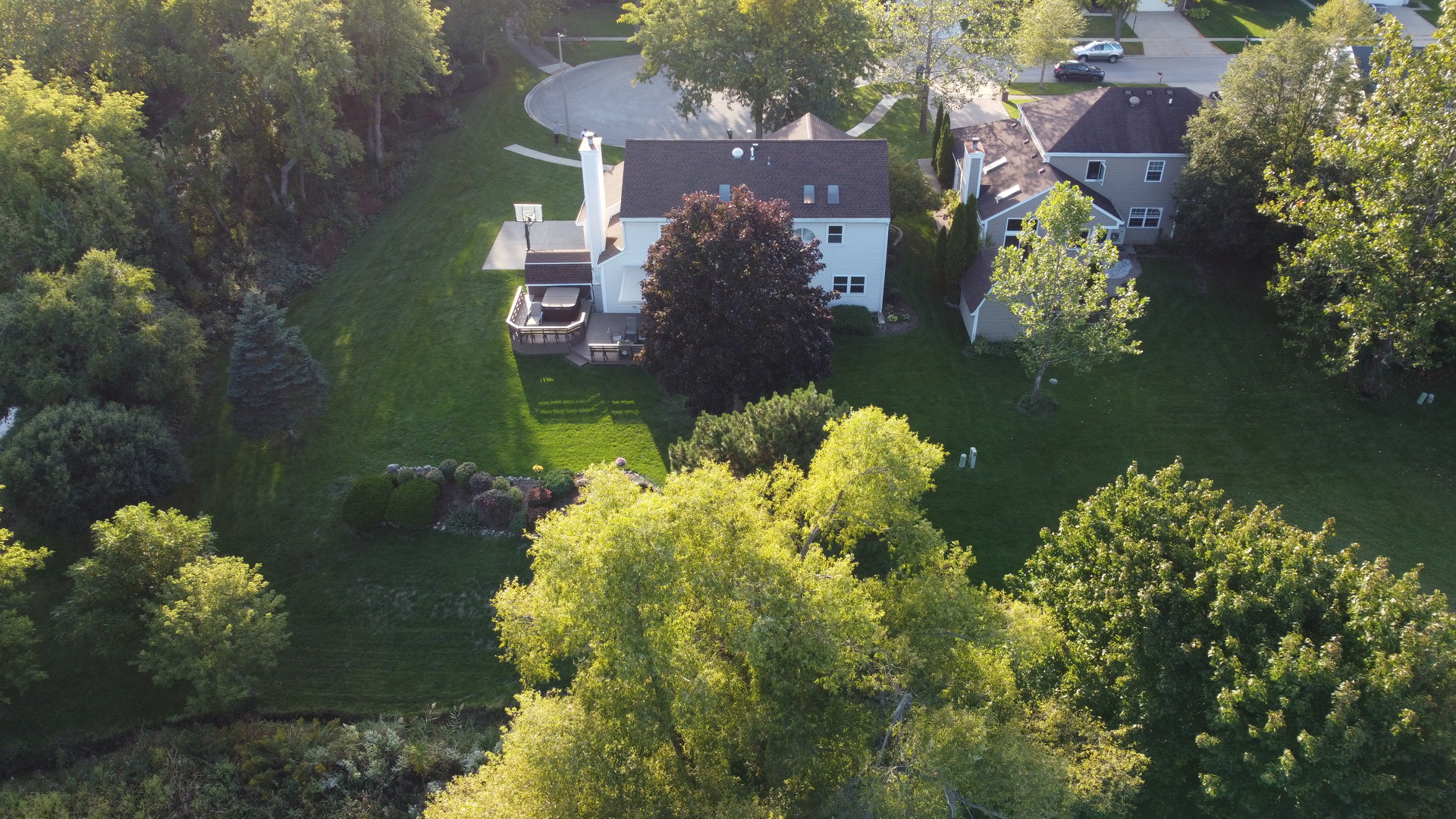 113 Bittersweet Lane Streamwood, IL 60107 - Photo 24 of 24 a aerial view of a house with a lake view