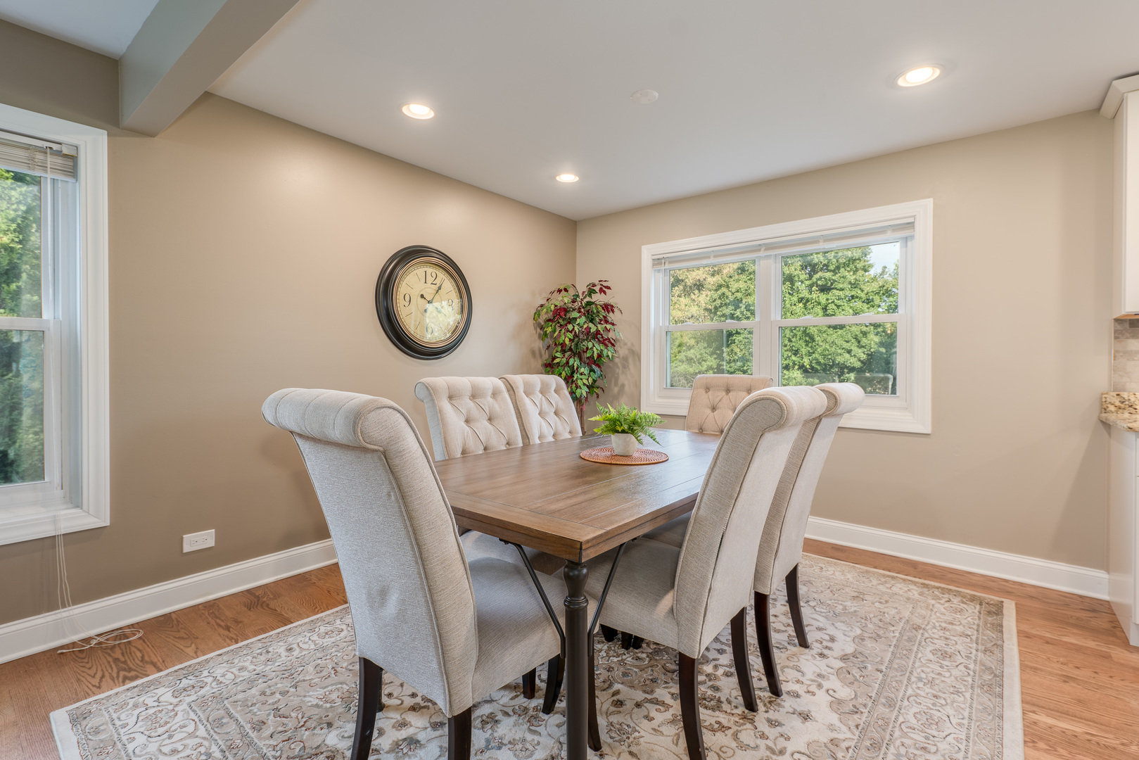 113 Bittersweet Lane Streamwood, IL 60107 - Photo 4 of 24 a view of a dining room with furniture window and wooden floor