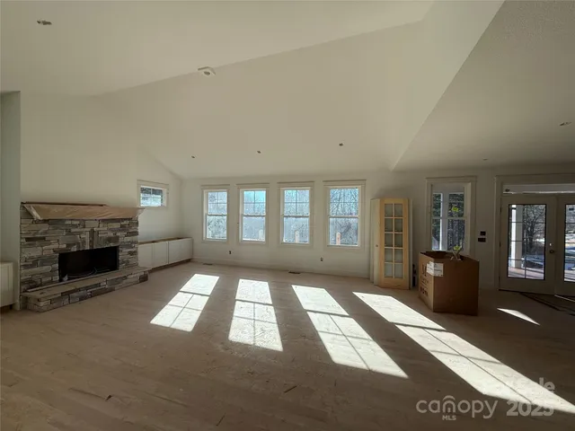 a front view of a house with parking space