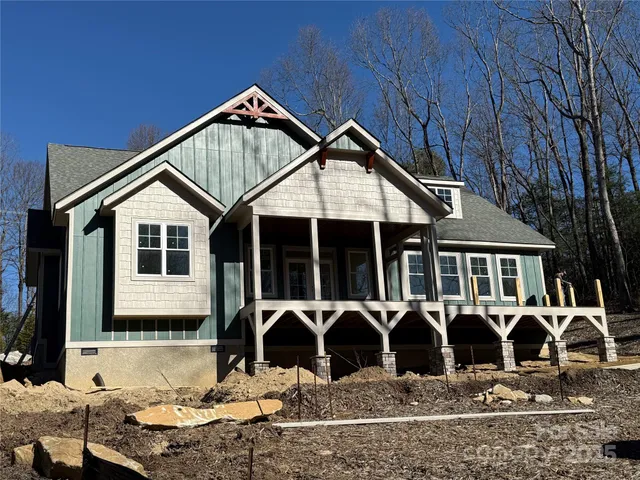 a view of a chairs and table in the patio
