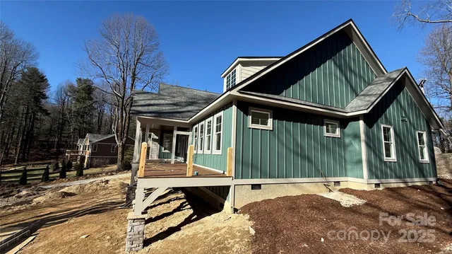 a picture of a bathroom with a shower and a mirror