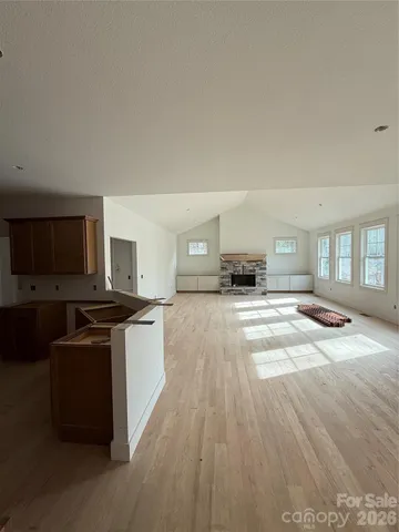 a kitchen with stainless steel appliances a refrigerator and a stove