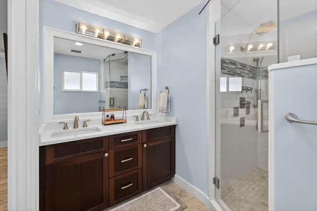 a view of a room with gym equipment and windows