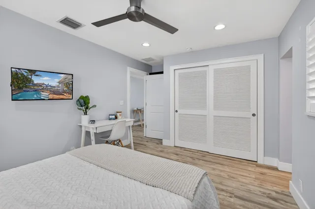 a swimming pool with outdoor seating yard and barbeque oven