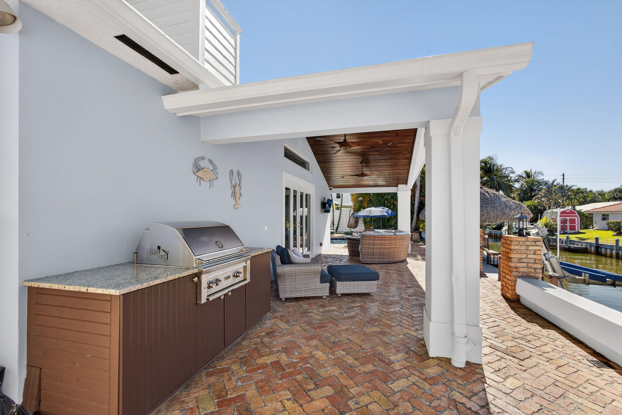 908 Penn Trail Jupiter, FL 33458 - Photo 47 of 67 Summer Kitchen