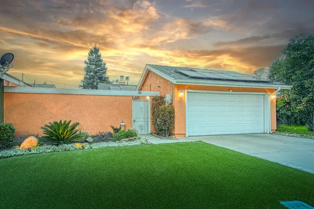 a view of a yard with an outdoor space