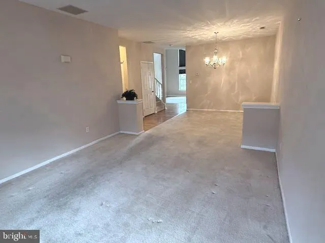 a view of a hallway with entryway