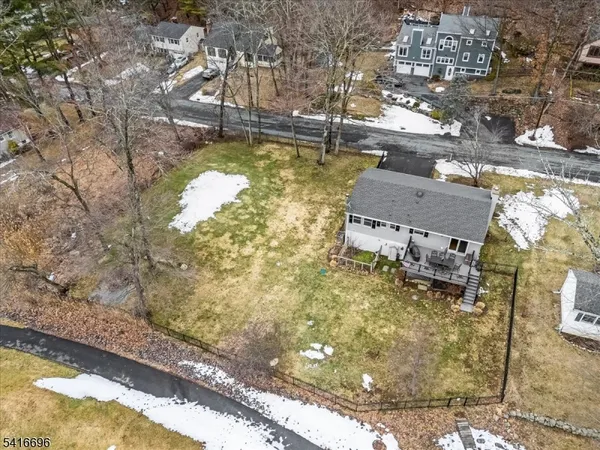 a house view with a backyard space