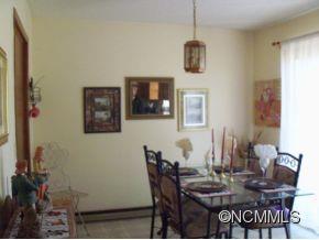 6 B Riverchase Sylva, NC 28779 - Photo 5 of 12 a view of a dining room with furniture