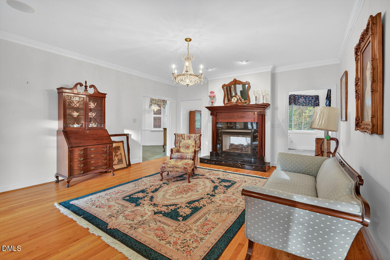 2204 Hayfield Drive Durham, NC 27705 - Photo 12 of 56 a living room with furniture and a fireplace