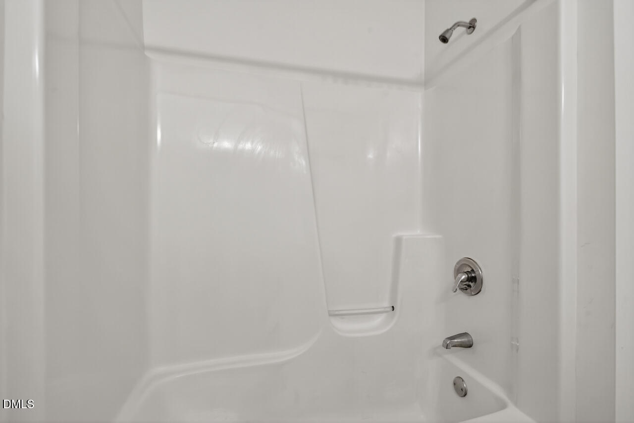 2204 Hayfield Drive Durham, NC 27705 - Photo 36 of 56 a bathroom with a bathtub