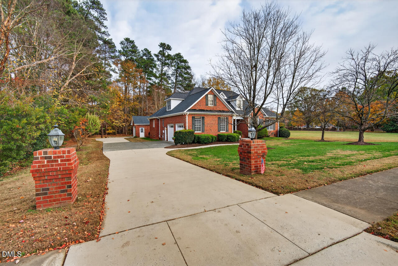 2204 Hayfield Drive Durham, NC 27705 - Photo 44 of 56 a front view of a house with a yard
