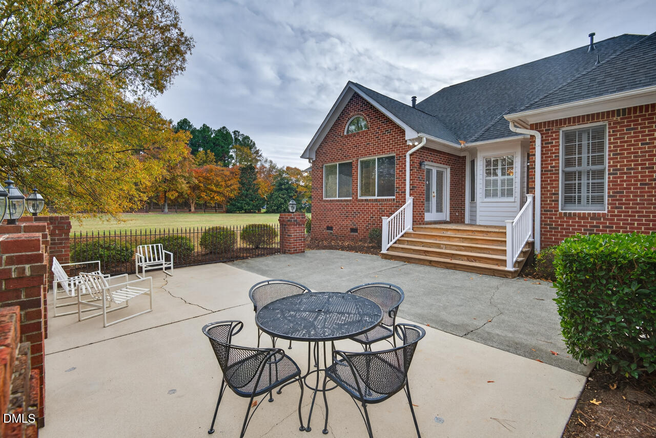 2204 Hayfield Drive Durham, NC 27705 - Photo 49 of 56 a view of a house with backyard and sitting area