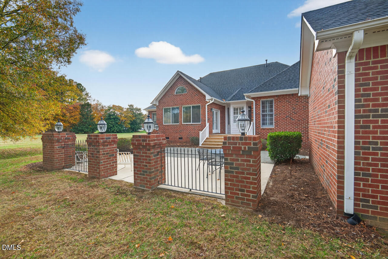 2204 Hayfield Drive Durham, NC 27705 - Photo 50 of 56 a front view of a house with a yard