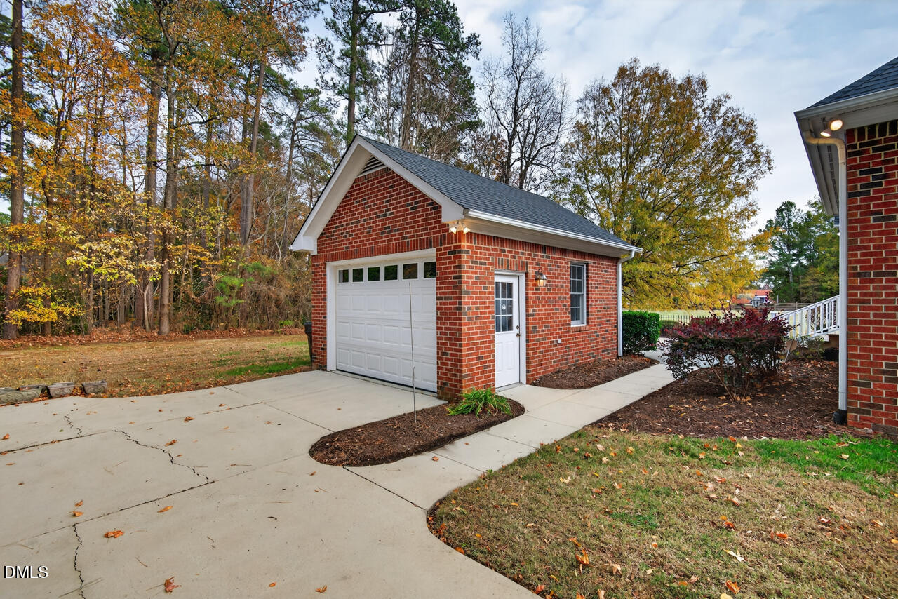 2204 Hayfield Drive Durham, NC 27705 - Photo 51 of 56 a front view of a house with garden