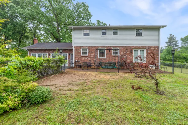 a view of a house with a big yard