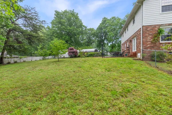 a view of a garden with a lake view