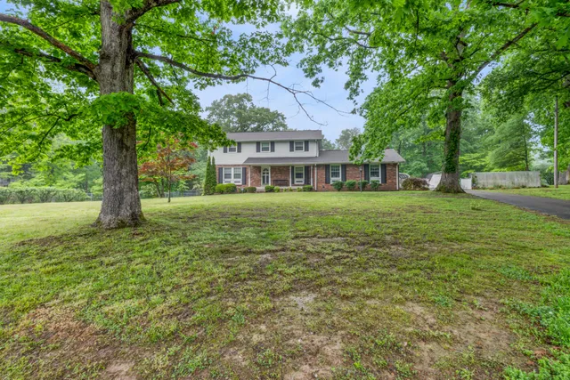 a view of a house with a big yard