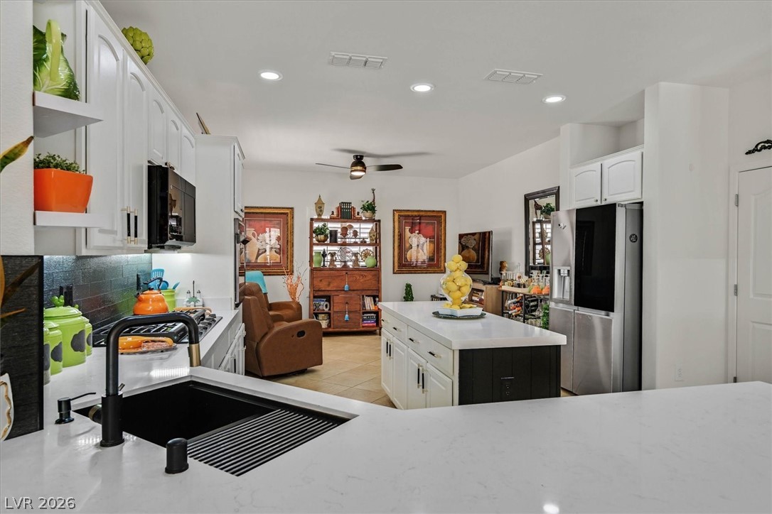 2228 Waterton Rivers Drive Henderson, NV 89044 - Photo 12 of 57 Re-imagined kitchen with cozy den area. This could be used as Breakfast nook or office.