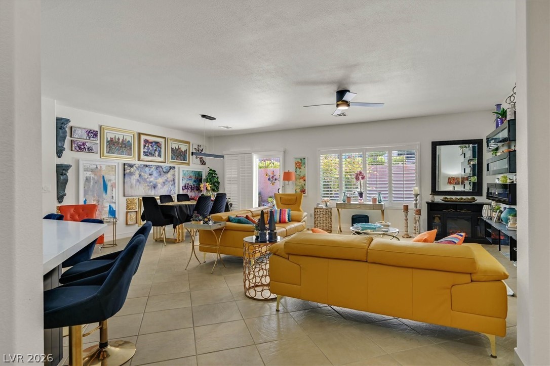 2228 Waterton Rivers Drive Henderson, NV 89044 - Photo 20 of 57 Great Room with new ceiling fan and custom shutters.