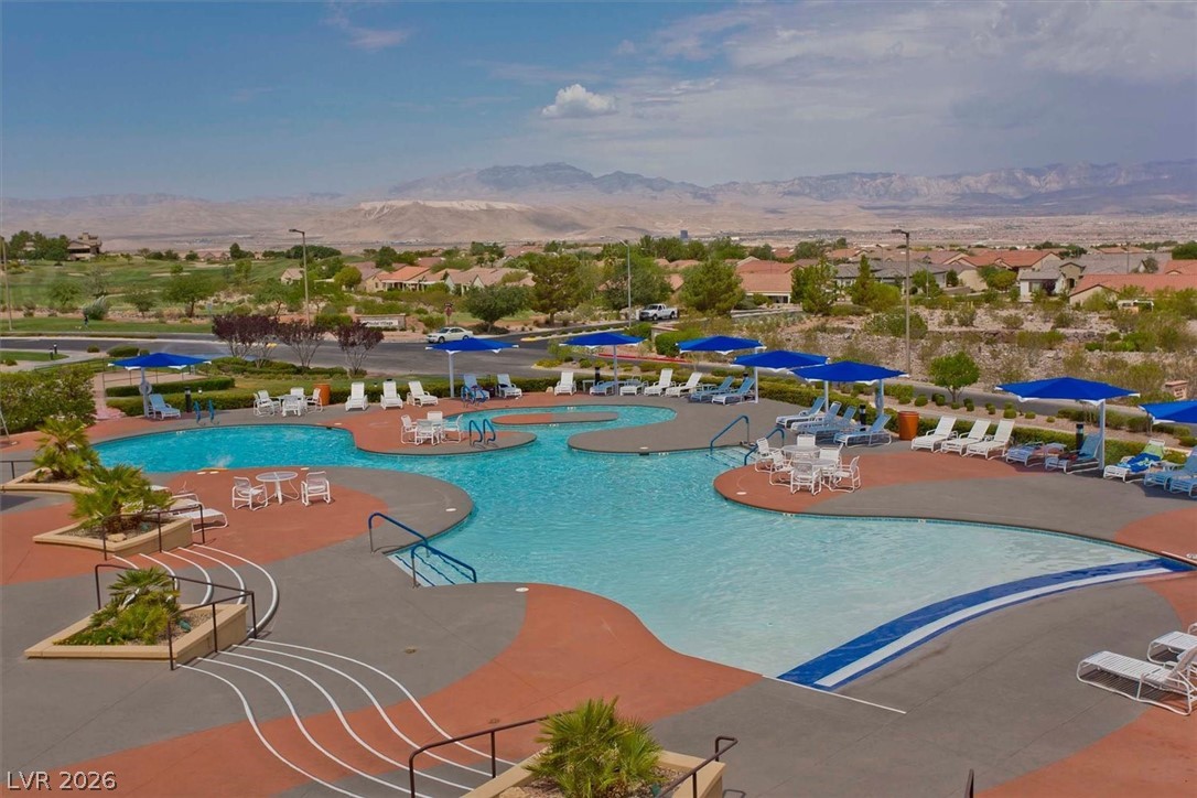 2228 Waterton Rivers Drive Henderson, NV 89044 - Photo 52 of 57 Main Clubhouse Pool and Spa. Incredible views.