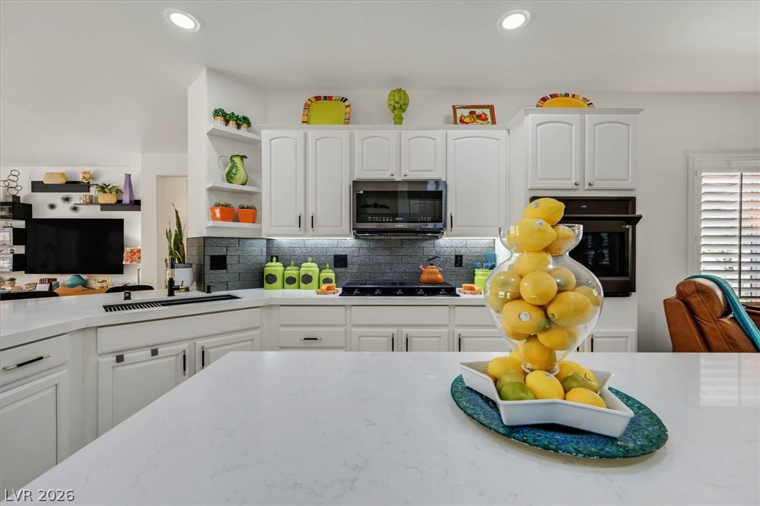 2228 Waterton Rivers Drive Henderson, NV 89044 - Photo 6 of 57 Beautiful quartz counters.