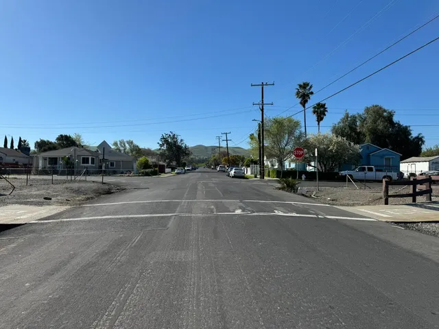 a view of street with houses