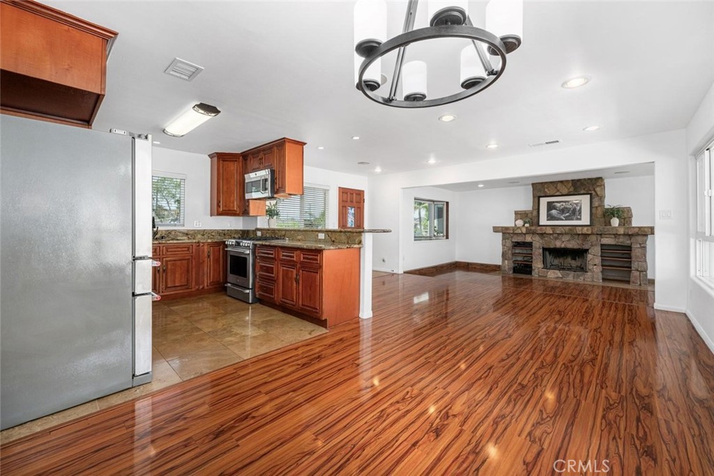 1238 North Studebaker Road Long Beach, CA 90815 - Photo 11 of 47 a view of kitchen with sink and wooden floor