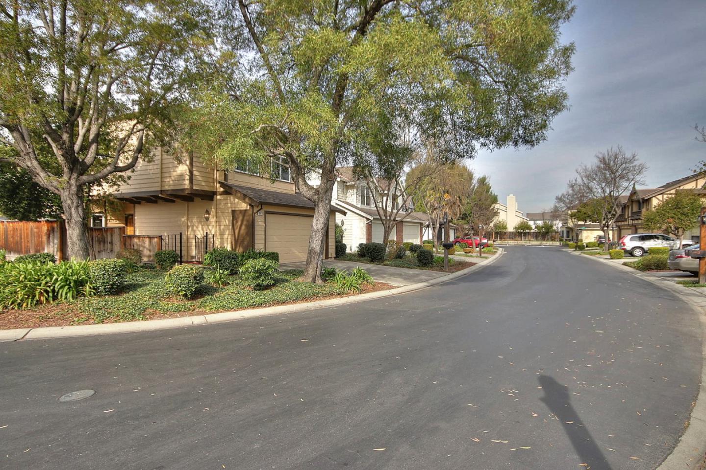 a view of a street with a house