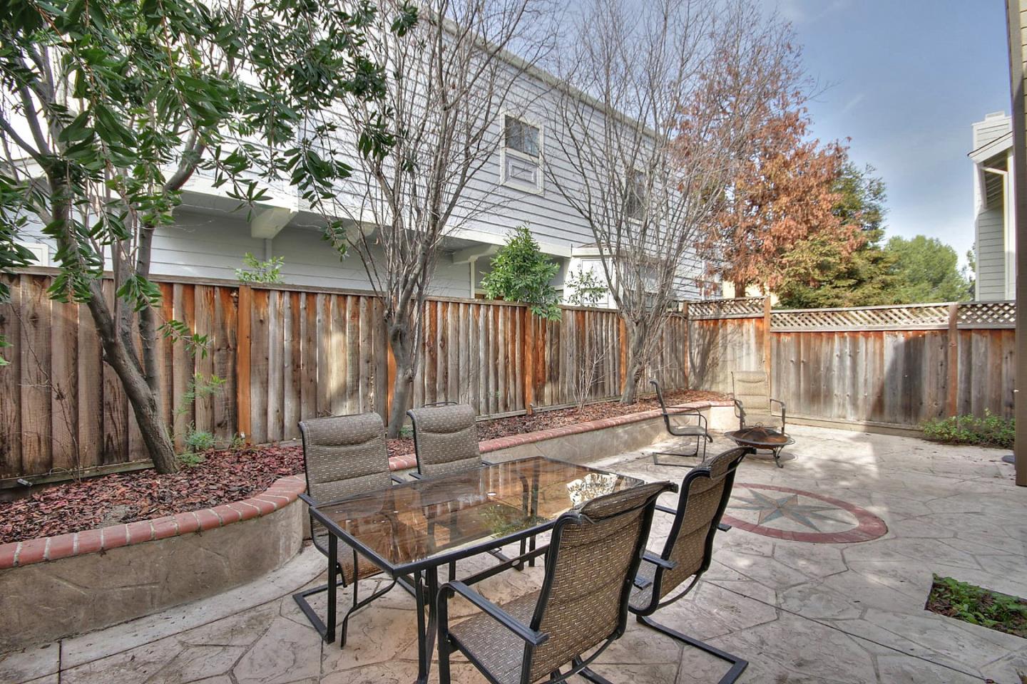 761 Superior Road Milpitas, CA 95035 - Photo 12 of 41 a backyard of a house with table and chairs