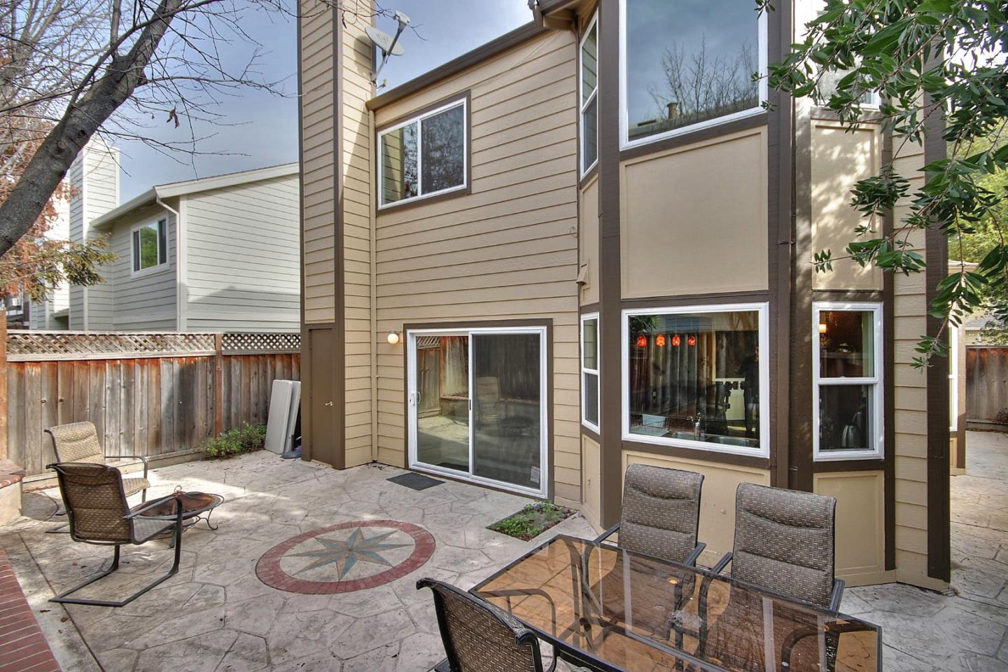 761 Superior Road Milpitas, CA 95035 - Photo 13 of 41 a view of a patio with table and chairs and potted plants