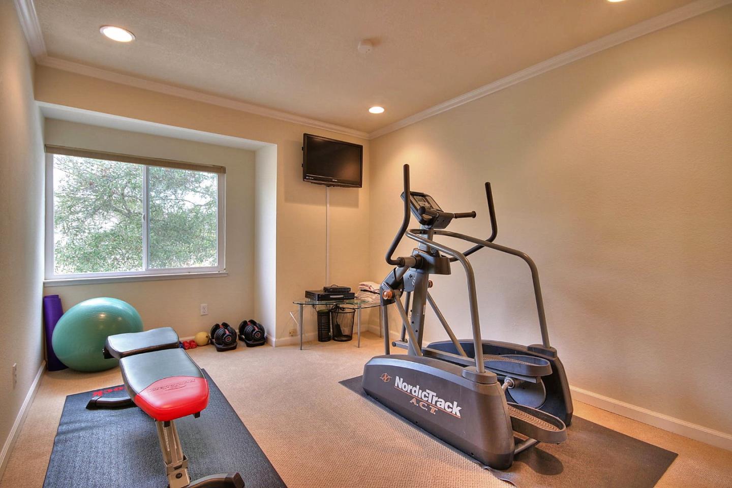 761 Superior Road Milpitas, CA 95035 - Photo 20 of 41 a room with gym equipment and windows