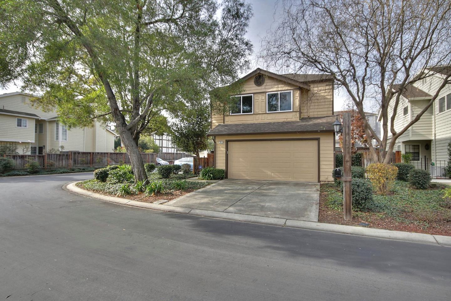 761 Superior Road Milpitas, CA 95035 - Photo 2 of 41 a front view of a house with a yard and garage