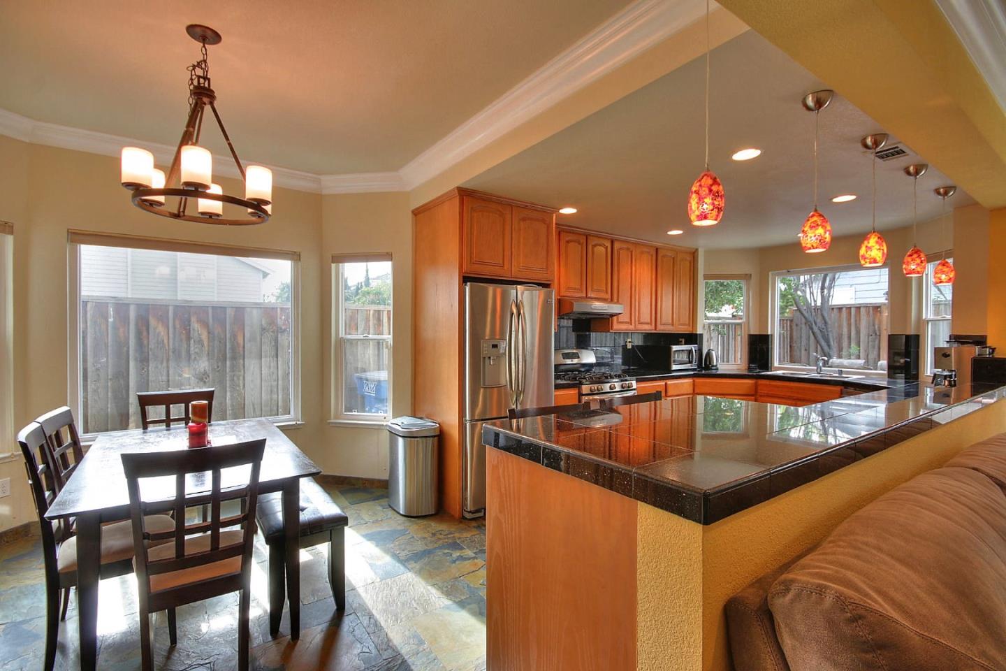 761 Superior Road Milpitas, CA 95035 - Photo 27 of 41 a kitchen with stainless steel appliances granite countertop a sink refrigerator and cabinets