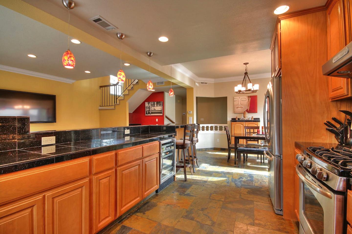 761 Superior Road Milpitas, CA 95035 - Photo 29 of 41 a kitchen with stainless steel appliances a stove and a refrigerator
