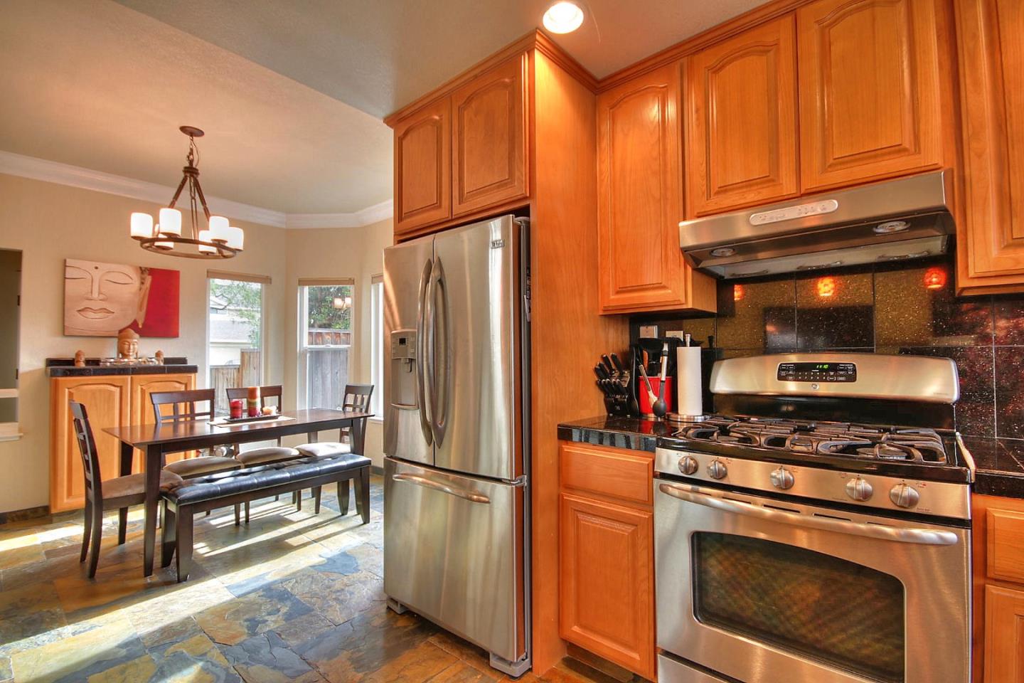 761 Superior Road Milpitas, CA 95035 - Photo 30 of 41 a kitchen with stainless steel appliances granite countertop a refrigerator a stove and a sink