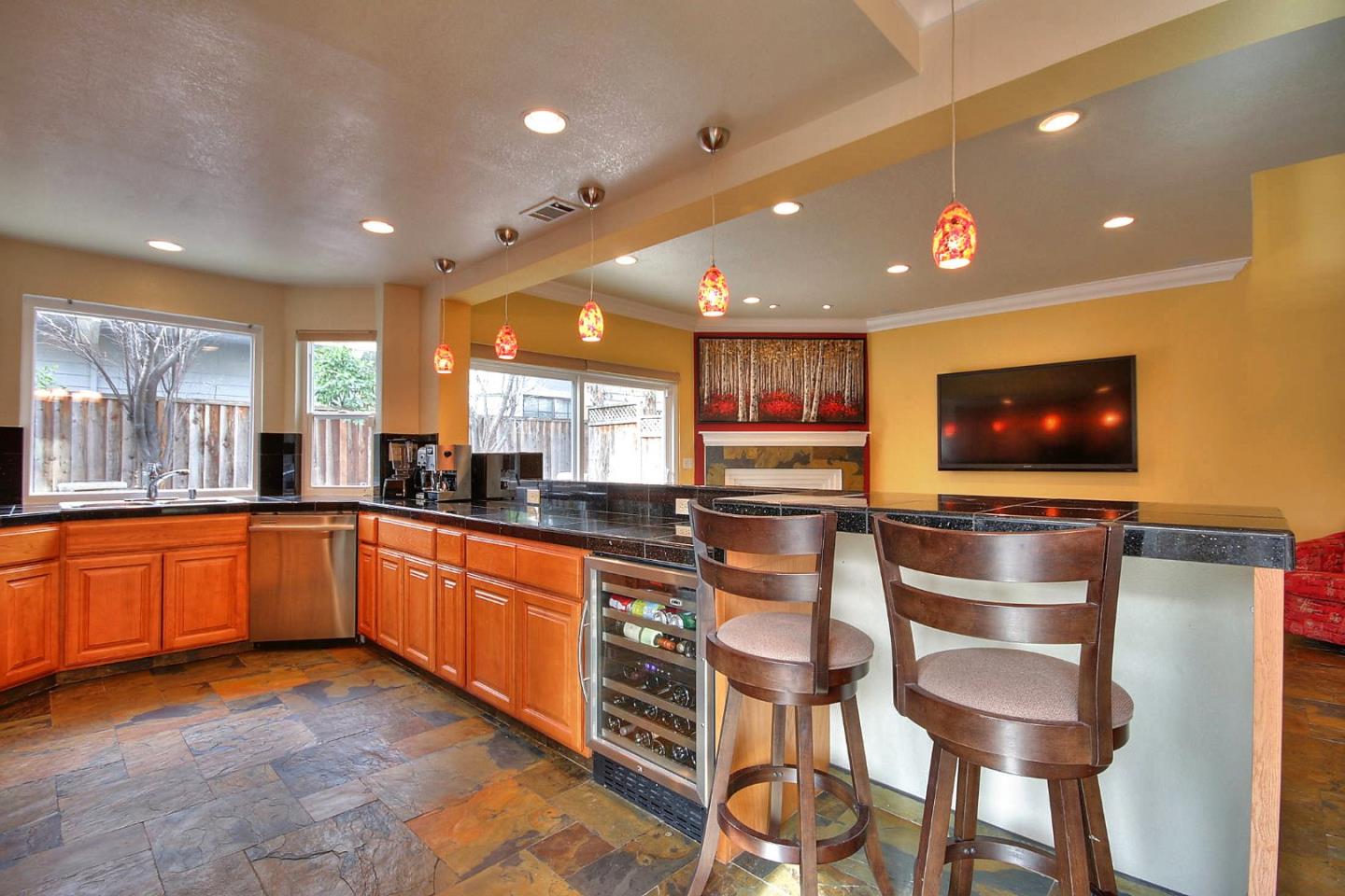 761 Superior Road Milpitas, CA 95035 - Photo 3 of 41 a kitchen with stainless steel appliances granite countertop a sink and a refrigerator