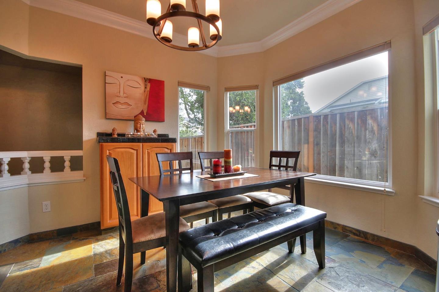 761 Superior Road Milpitas, CA 95035 - Photo 31 of 41 a view of a dining room with furniture window and wooden floor