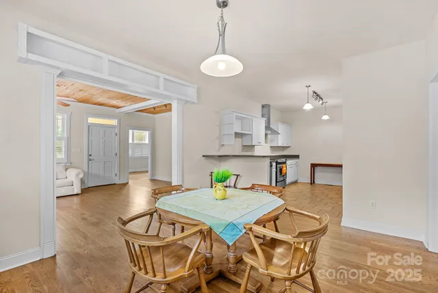 a view of a dining room with furniture