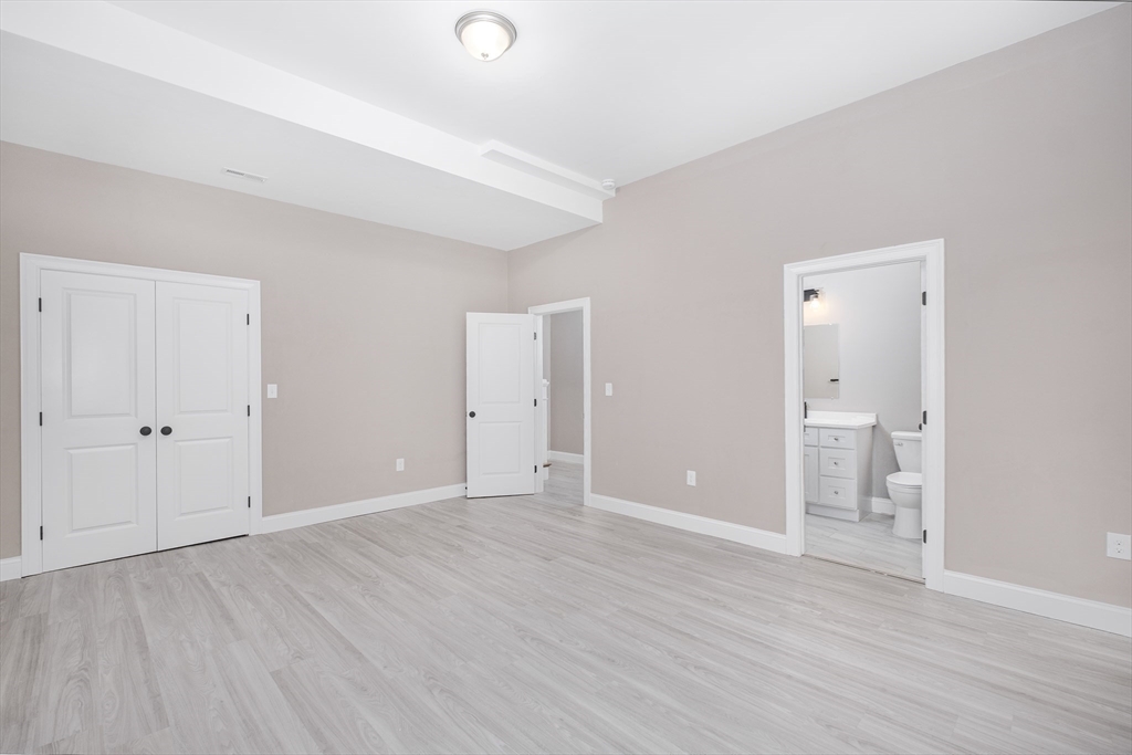 216 Vane Street, Unit 2 Revere, MA 02151 - Photo 9 of 22 wooden floor in an empty room