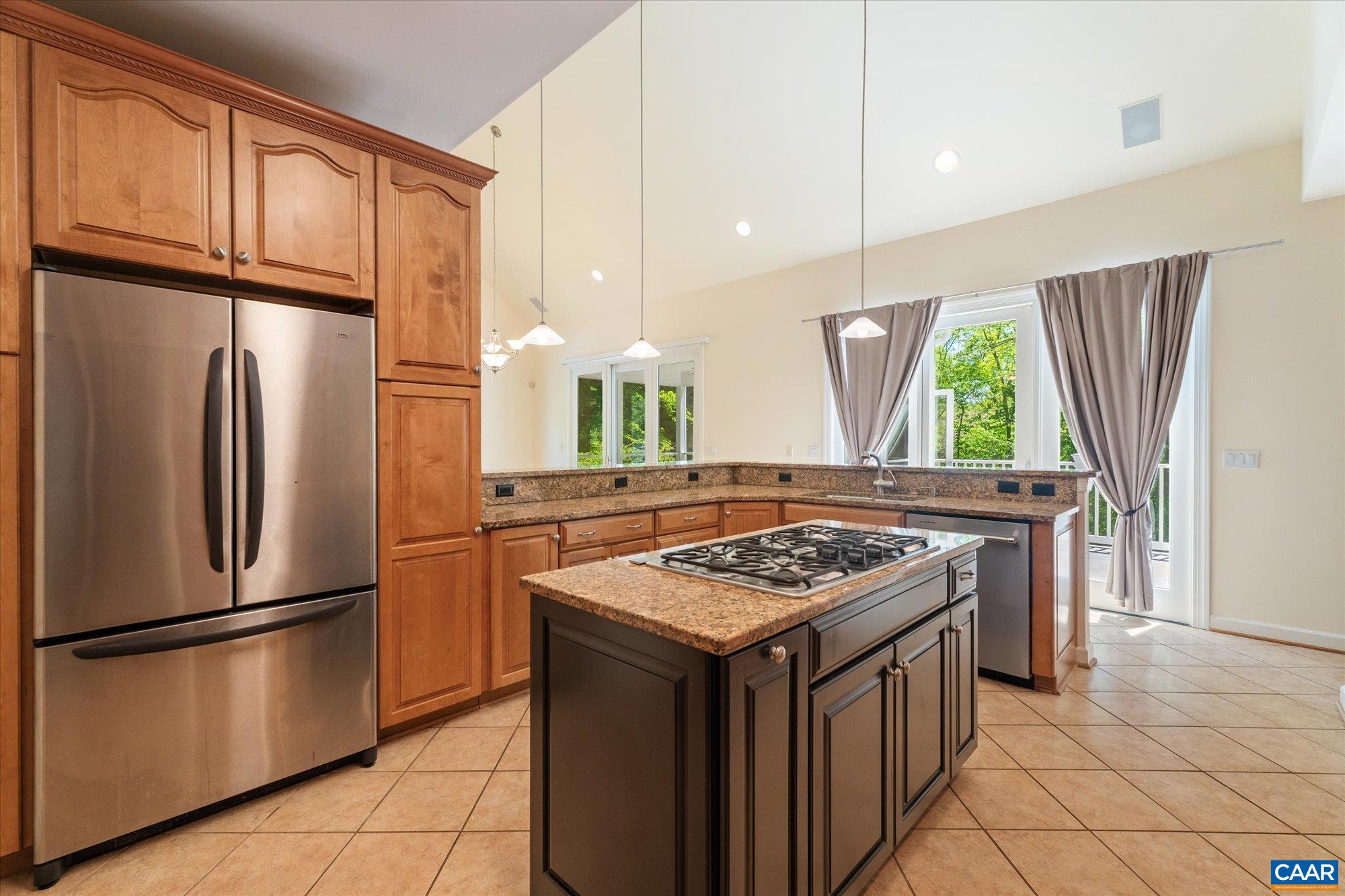 1698 Broken Island Road Palmyra, VA 22963 - Photo 16 of 74 a kitchen with stainless steel appliances granite countertop a refrigerator a sink a stove and a refrigerator