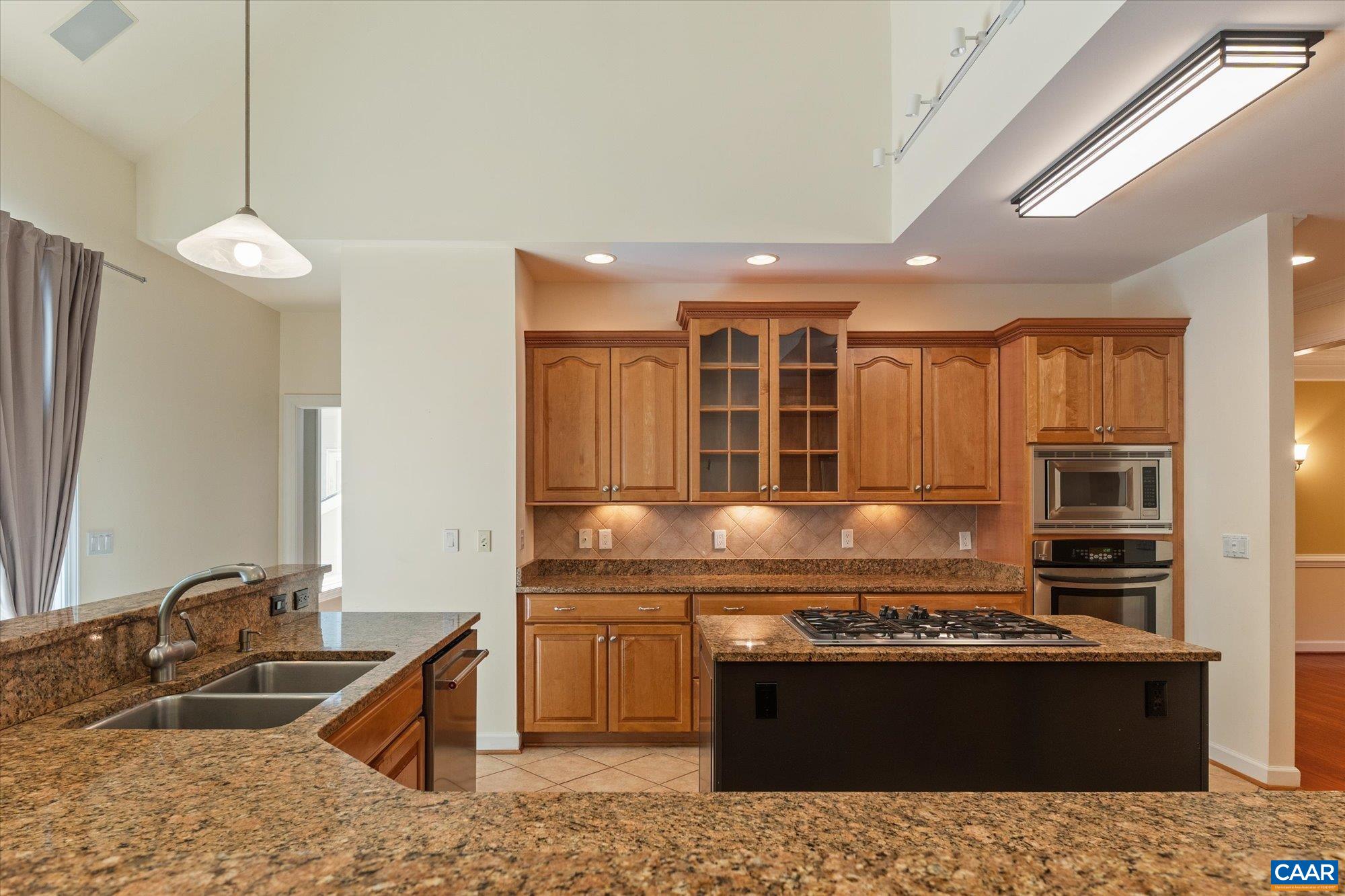 1698 Broken Island Road Palmyra, VA 22963 - Photo 20 of 74 a kitchen with stainless steel appliances granite countertop a sink stove and refrigerator