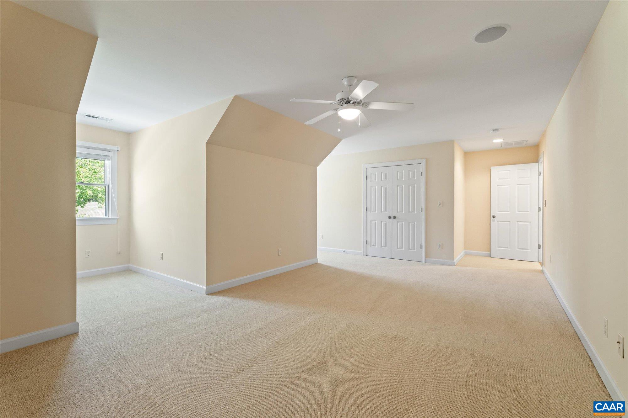 1698 Broken Island Road Palmyra, VA 22963 - Photo 48 of 74 an empty room with chandelier fan and windows