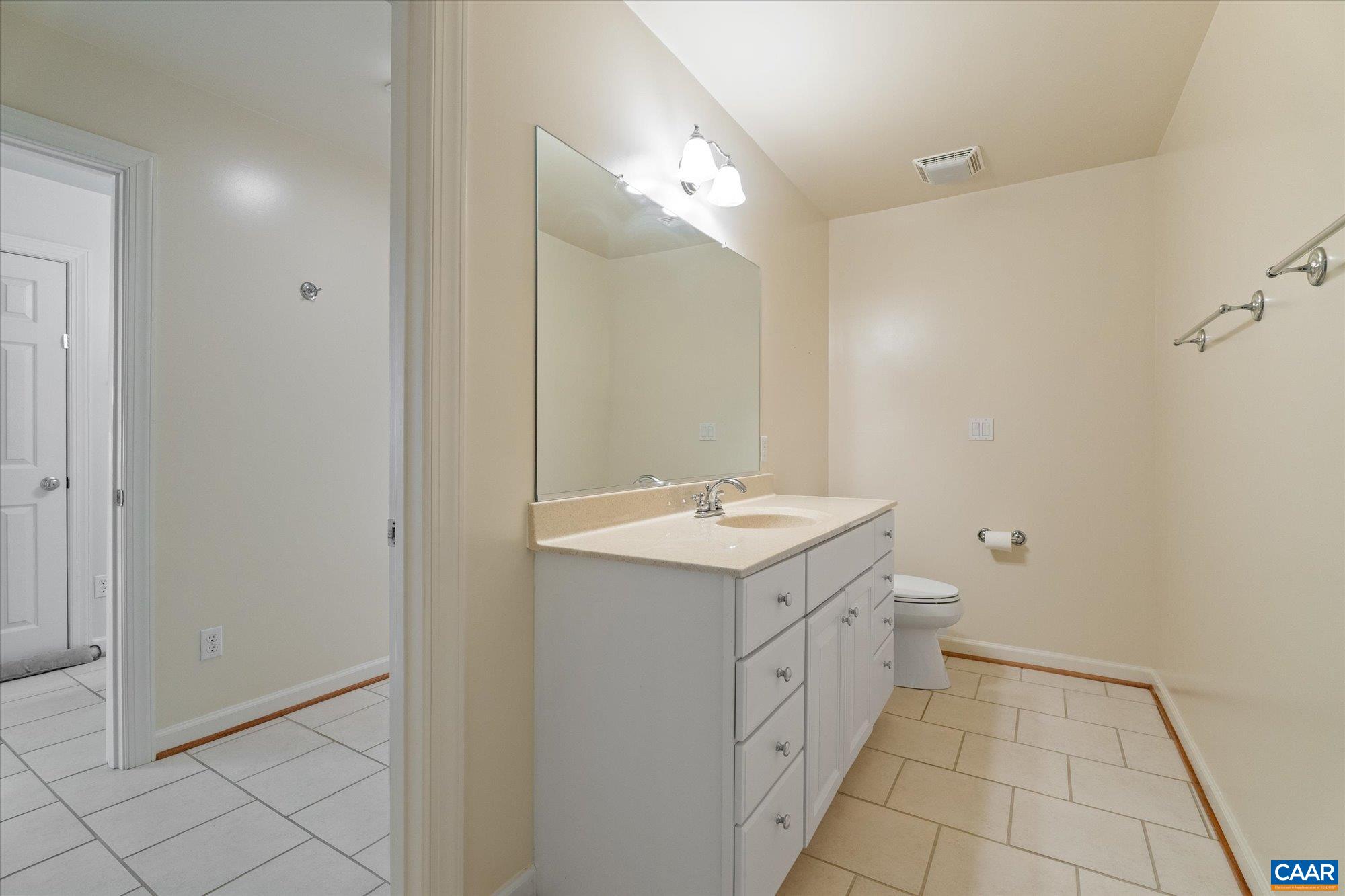 1698 Broken Island Road Palmyra, VA 22963 - Photo 49 of 74 a view of a bathroom with a sink and mirror
