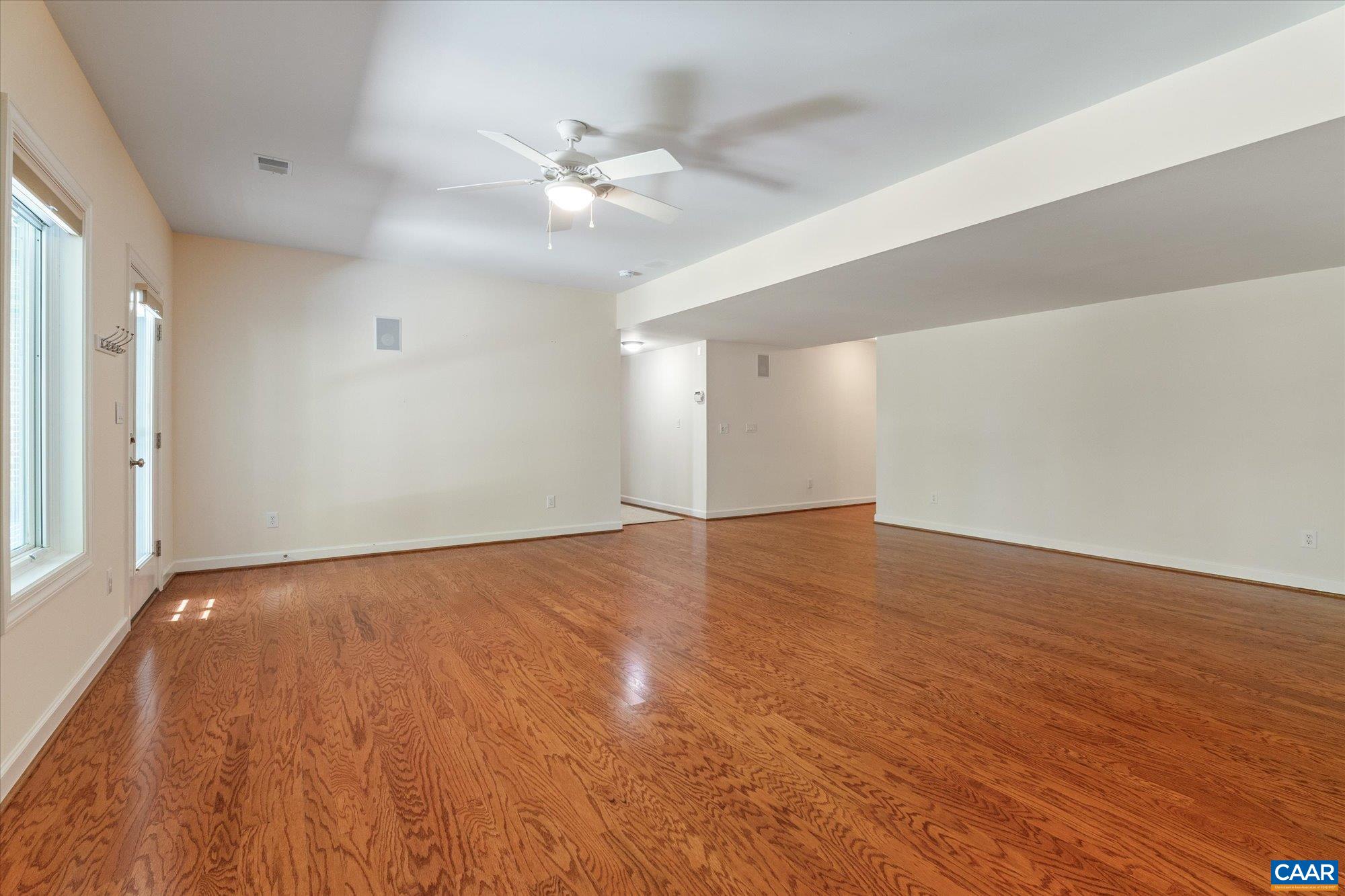 1698 Broken Island Road Palmyra, VA 22963 - Photo 54 of 74 a view of an empty room with wooden floor and a window