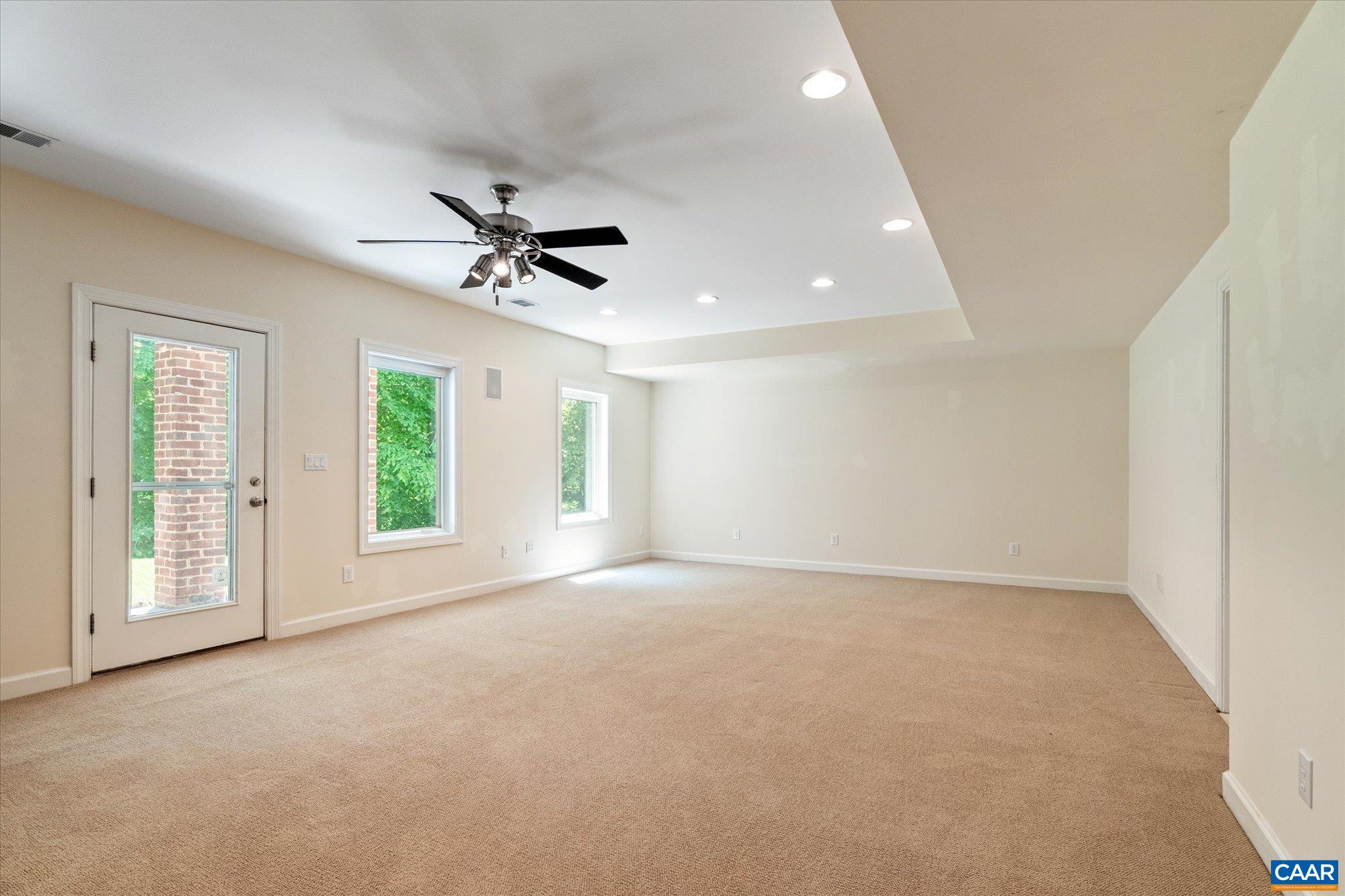 1698 Broken Island Road Palmyra, VA 22963 - Photo 57 of 74 an empty room with a ceiling fan and windows