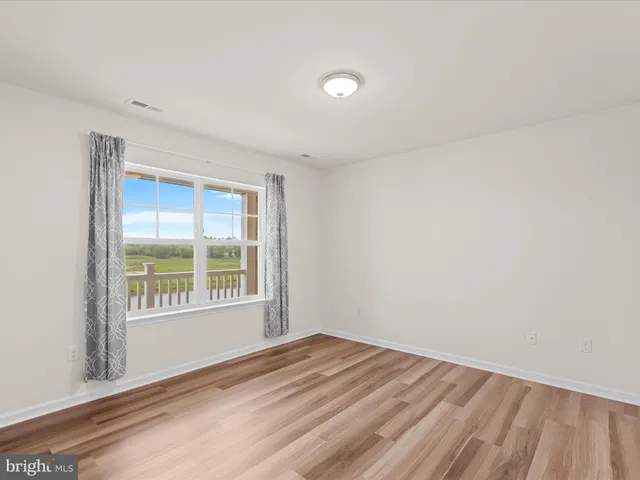 a bathroom with a shower and a toilet