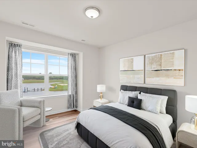 a front view of a building with a garden